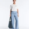 T-shirt squadrata in misto cotone con slogan T-shirt squadrata in misto cotone con slogan