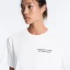 T-shirt squadrata in misto cotone con slogan T-shirt squadrata in misto cotone con slogan