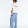 T-shirt squadrata in misto cotone con slogan T-shirt squadrata in misto cotone con slogan