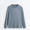 T-shirt tecnica a maniche lunghe con scritta T-shirt tecnica a maniche lunghe con scritta