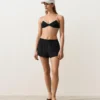 Top bikini con bordi a contrasto