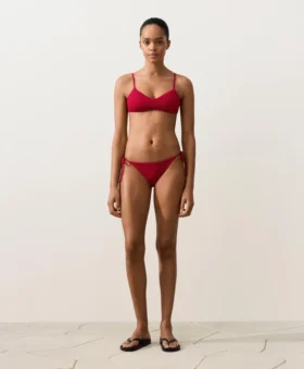 Slip bikini a copertura media con tessuto a nido d’ape e lacci