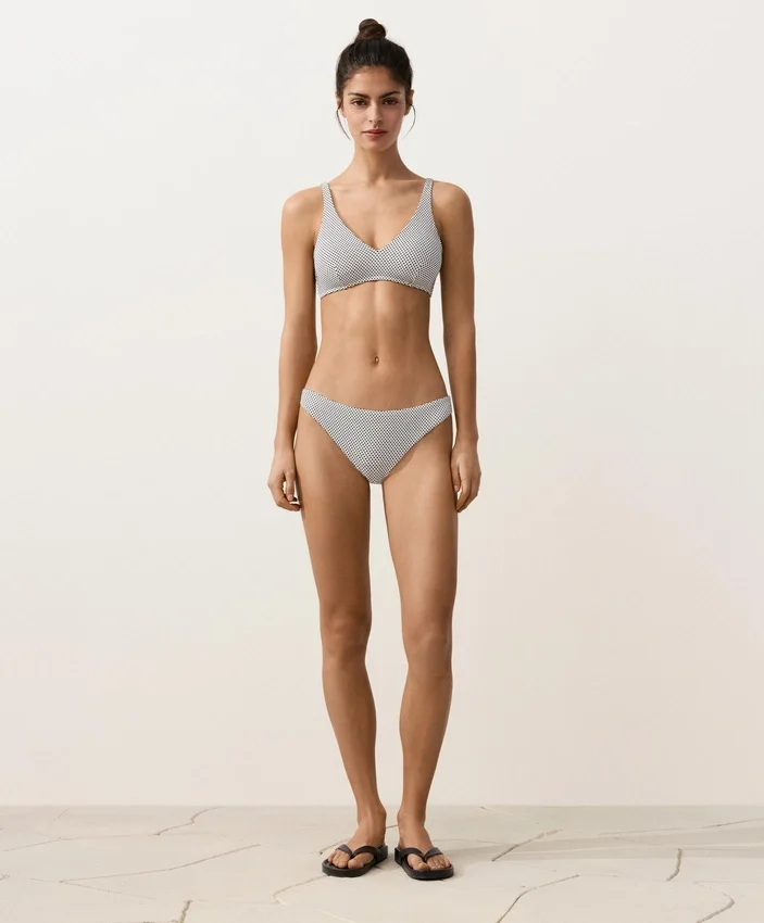 Slip bikini classico in jacquard a pois Slip bikini classico in jacquard a pois