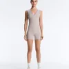 Tuta corta compressiva a contrasto in pantaloncini
