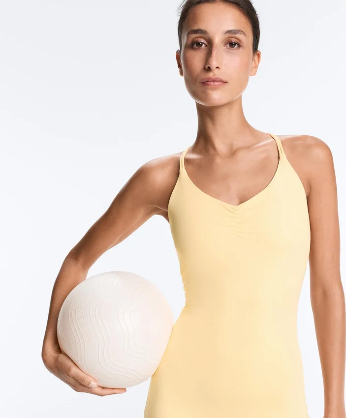 Tuta intera Comfortlux con dettaglio a nodo Tuta intera Comfortlux con dettaglio a nodo