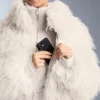 Tuta intera elasticizzata svasata 2 in 1, impermeabile e rimovibile Tuta intera elasticizzata svasata 2 in 1, impermeabile e rimovibile