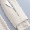 Tuta intera elasticizzata svasata 2 in 1, impermeabile e rimovibile Tuta intera elasticizzata svasata 2 in 1, impermeabile e rimovibile